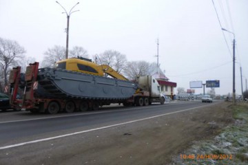Перевозка спецтехники. Перевозка негабаритных грузов.